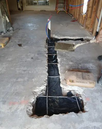 Rough-in plumbing pipes during new home construction